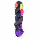 Skein of Araucania Huasco Sock Prism Paints yarn color black yellow pink purple