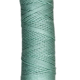 Skein of Coastal Cotton Yarn in the color icy green 