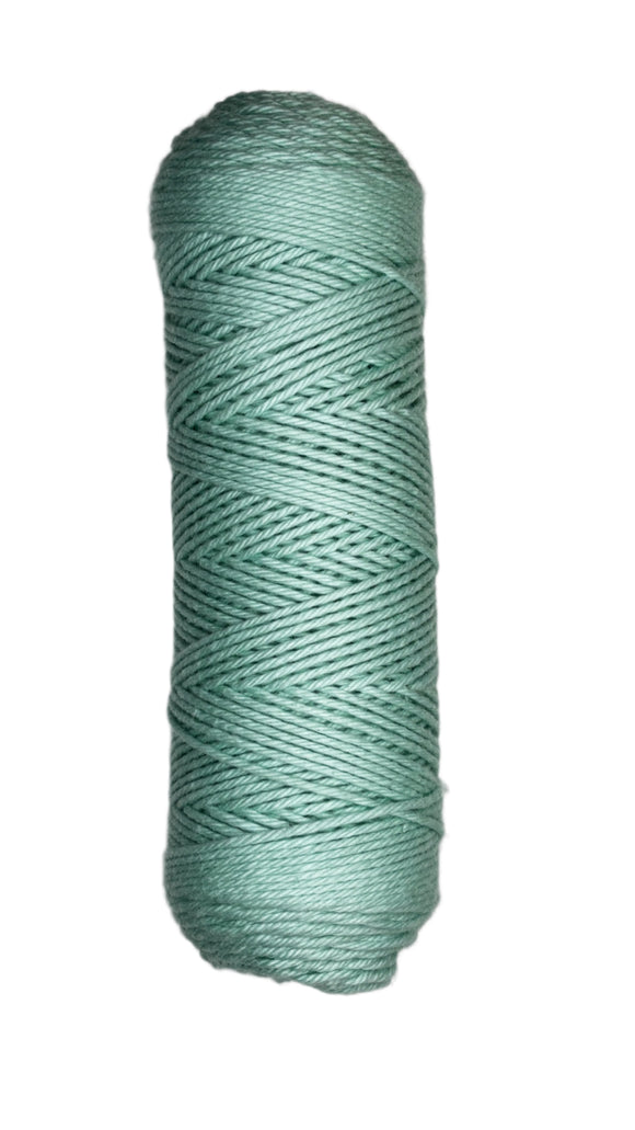 Skein of Coastal Cotton Yarn in the color icy green 