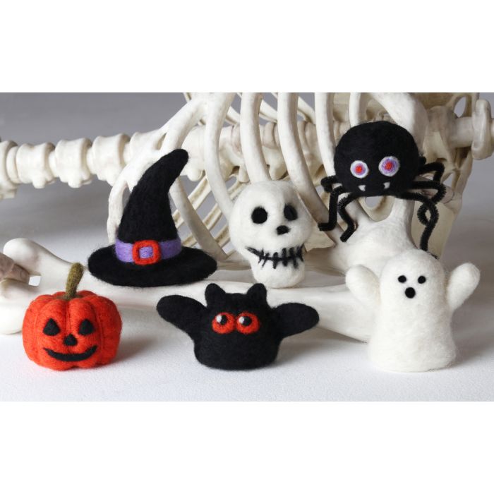 Ashford Needle Felting Halloween Kit; Pumpkin, Skull, Witches Hat, Spider, Bat and Ghost in front of a skeleton