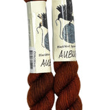 Mini Skeins of Hand Dyed yarn in the color auburn