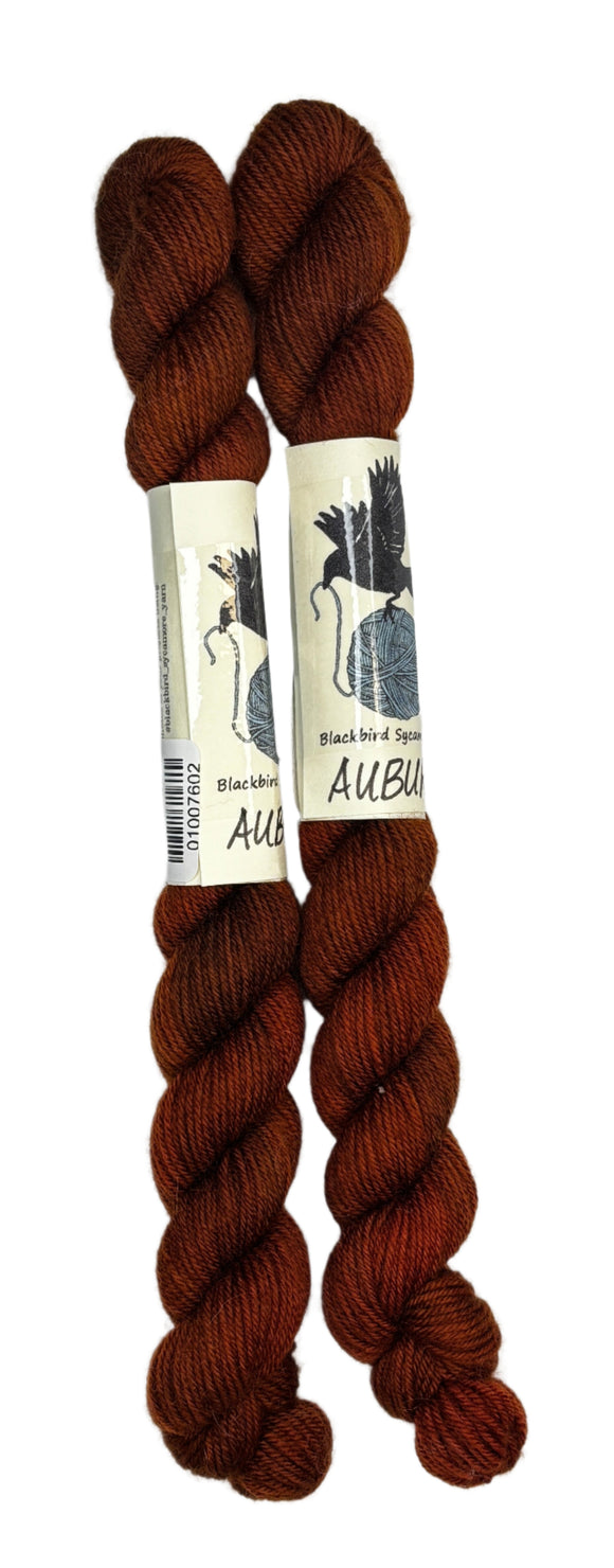 Mini Skeins of Hand Dyed yarn in the color auburn