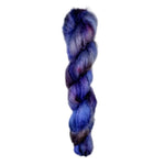 Skein of superkid mohair silk lace weight yarn color purple blue