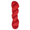 A skein of hand-dyed fingering/sock yarn color red