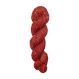 Red yarn with black and white specks