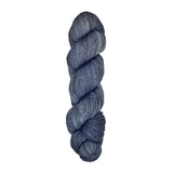 A skein of hand-dyed fingering/sock yarn color black