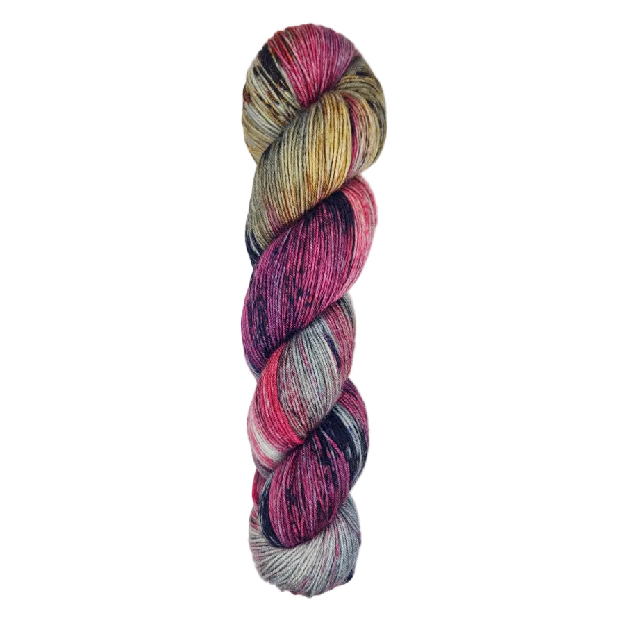 A skein of hand-dyed fingering/sock yarn color grey golden yellow red purple black speckles