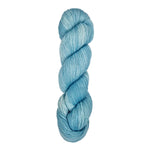 A skein of hand-dyed fingering/sock yarn color light grey white blue 