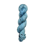 Skein of hand dyed BFL Tweed Yarn color sky blue