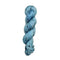 Skein of hand dyed BFL Tweed Yarn color sky blue
