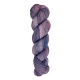 A skein of hand-dyed fingering/sock yarn color purple blue pink