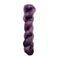 Skein of superkid mohair silk lace weight yarn color purple black