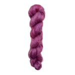 Skein of superkid mohair silk lace weight yarn color red 