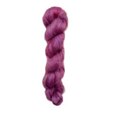 Skein of superkid mohair silk lace weight yarn color red 