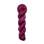 Skein of hand dyed BFL Tweed Yarn color wine red