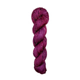 Skein of hand dyed BFL Tweed Yarn color wine red