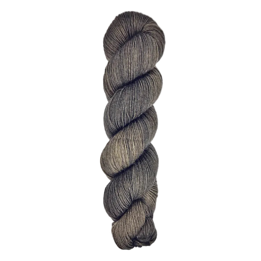 A skein of hand-dyed fingering/sock yarn color dark gray brown