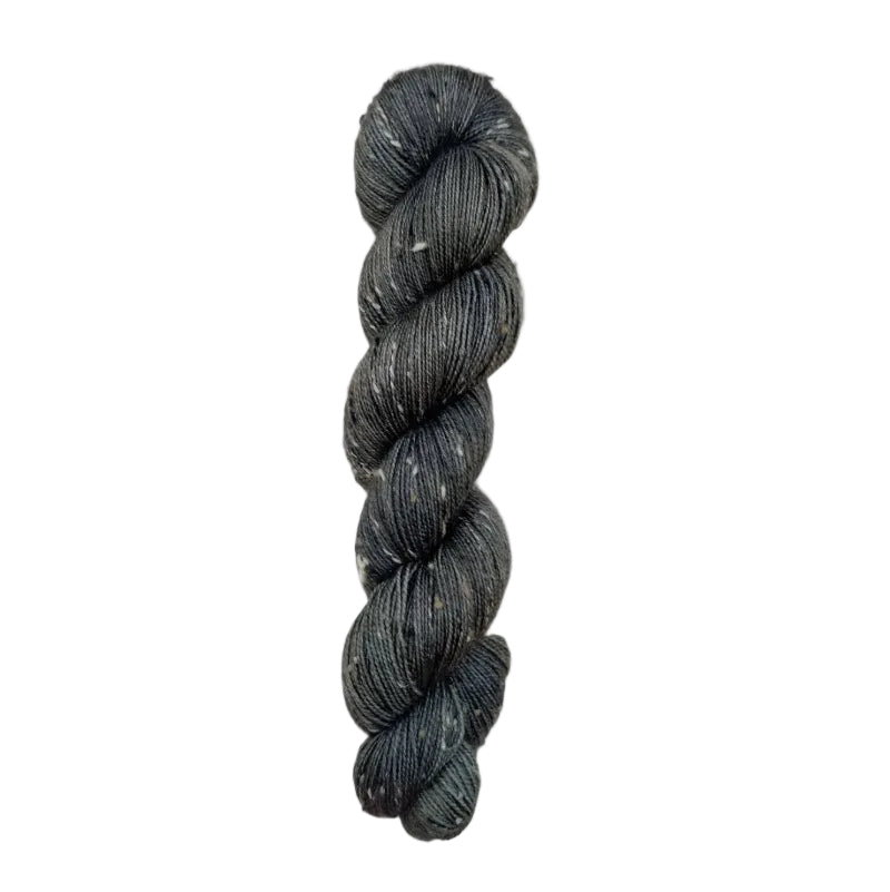 Skein of hand dyed BFL Tweed Yarn color steel grey 