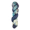 A skein of hand-dyed fingering/sock yarn color sky blue black white grey speckles