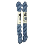 Mini Skeins of Hand Dyed yarn in the color denim blue