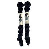 Mini skeins of hand dyed fingering weight yarn in the color black
