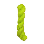 A bright neon yellow-green skein of twisted fuzzy yarn 