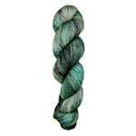 A skein of hand-dyed fingering/sock yarn color grey green black speckles