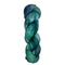 Skein of hand dyed fingering weight yarn in the color blue teal green 