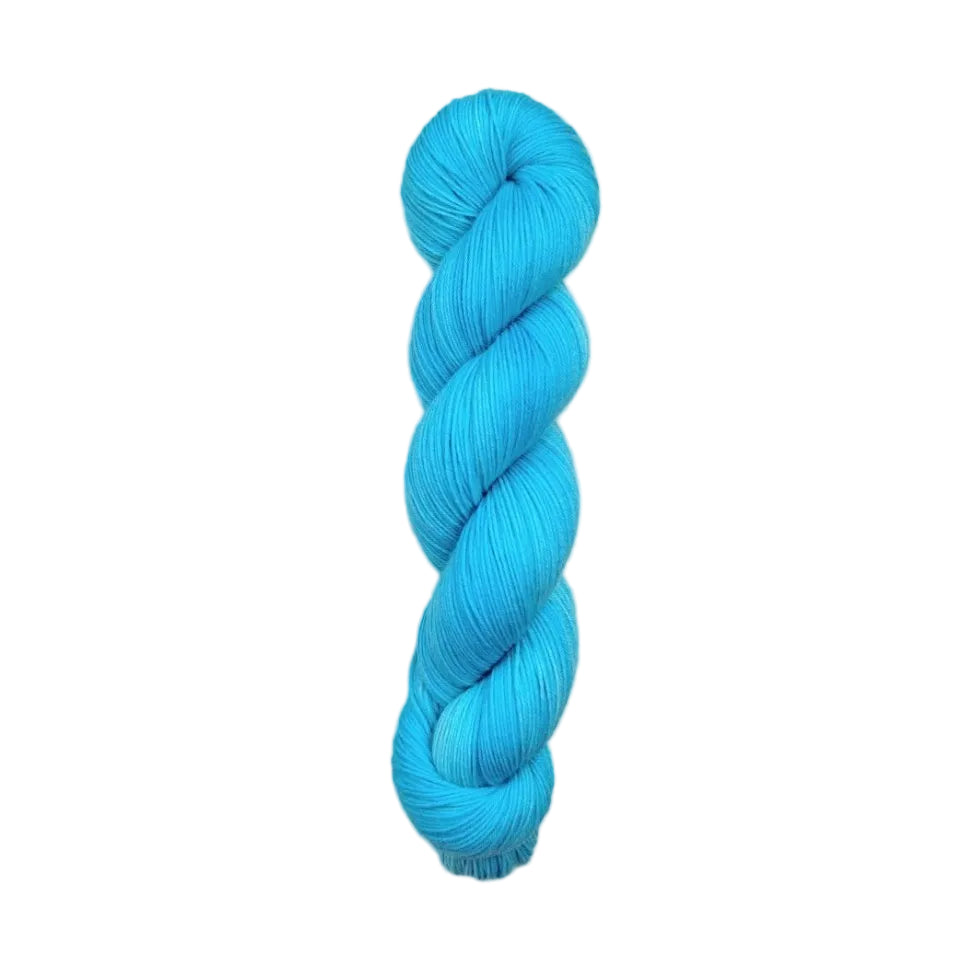 A single skein of bright turquoise blue yarn 