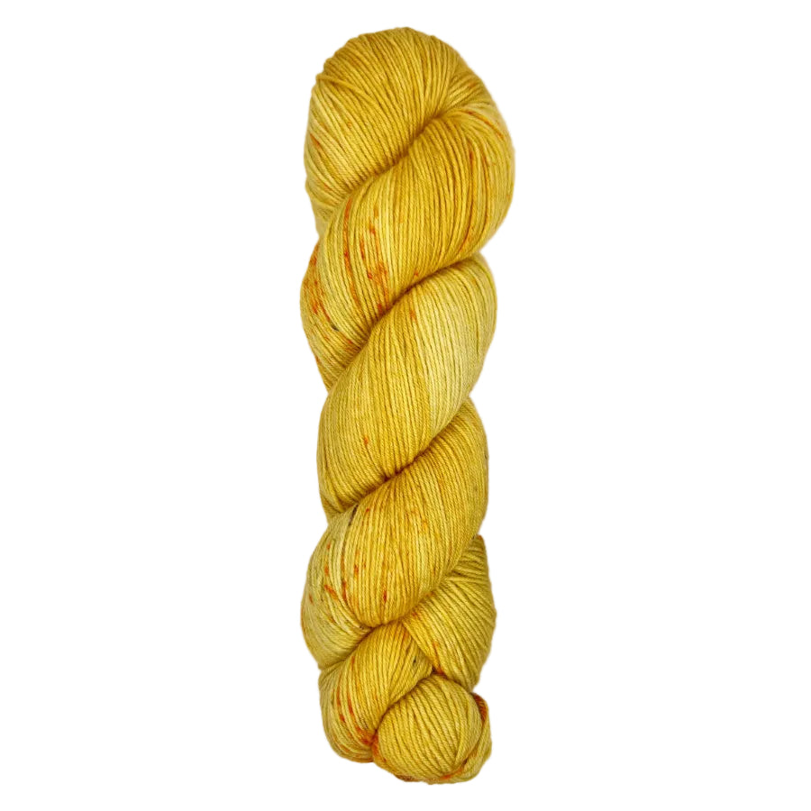 A skein of hand-dyed fingering/sock yarn color golden yellow orange speckles