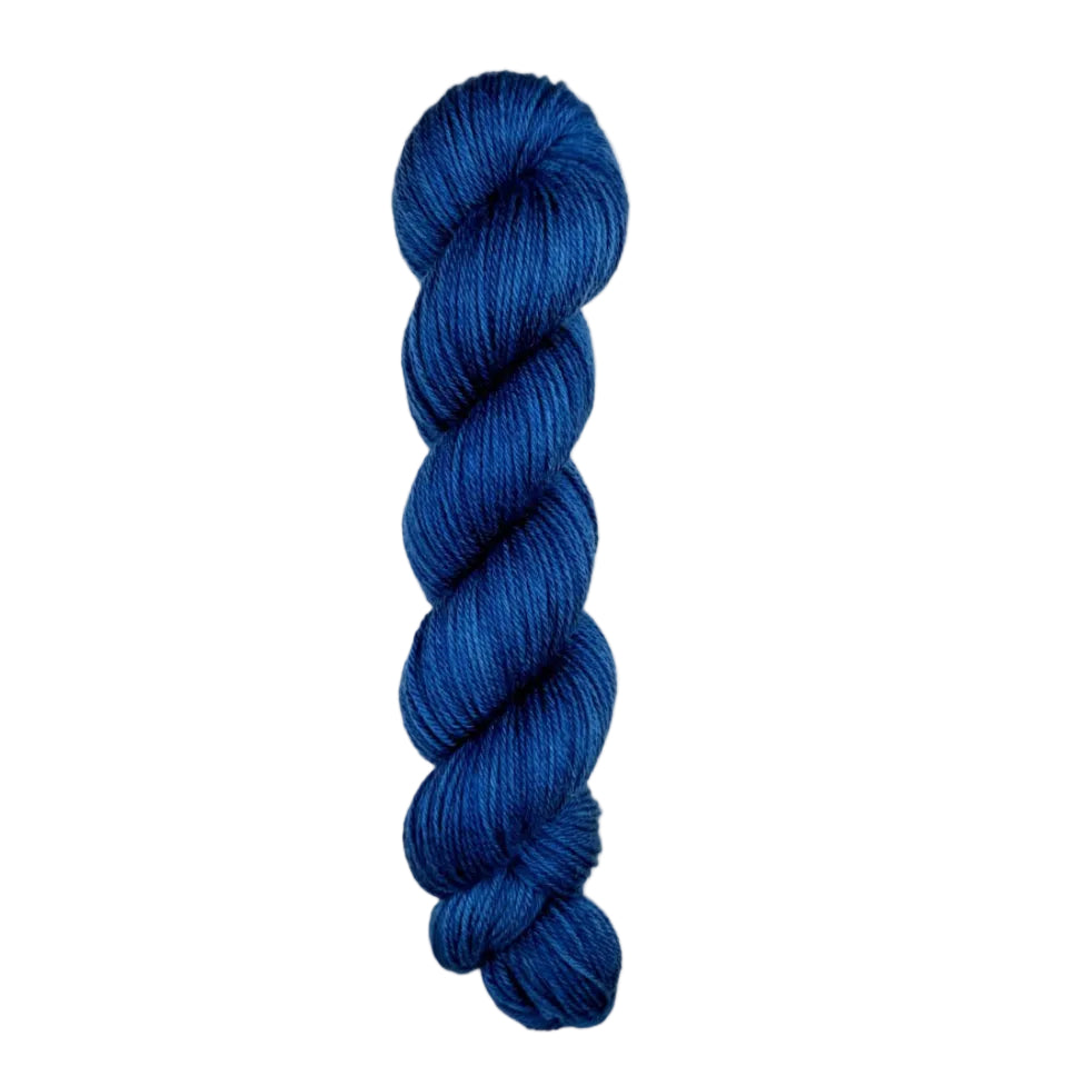 A skein of hand-dyed fingering/sock yarn color navy