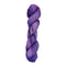 A skein of hand-dyed fingering/sock yarn color purple blue red speckles