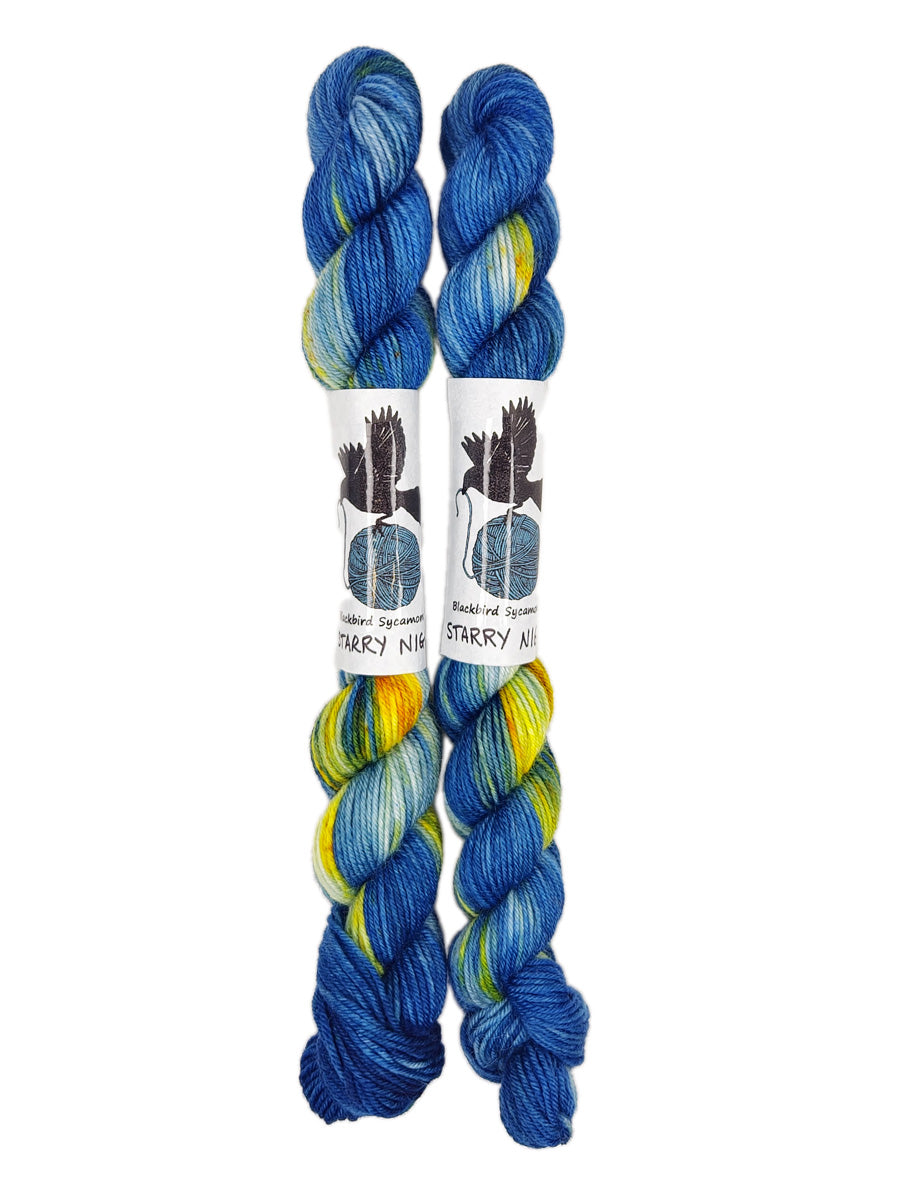 Blackbird Sycamore Fingering Mini Skein Yarn Color navy yellow orange speckles