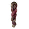 A skein of hand-dyed fingering/sock yarn color brown tan red speckles