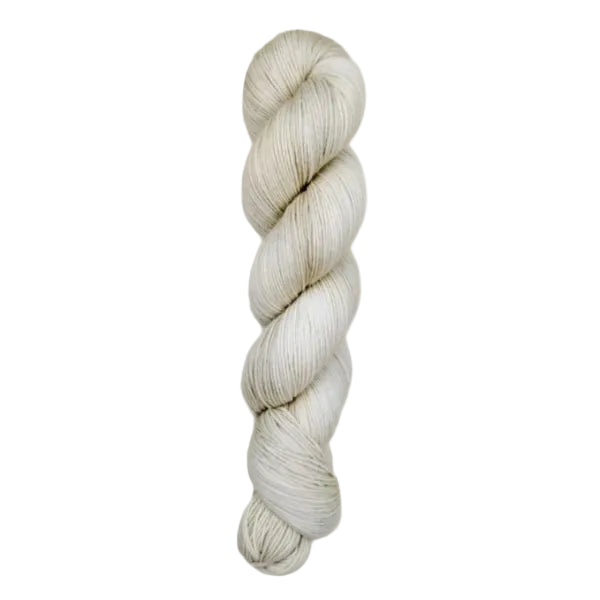 A skein of hand-dyed fingering/sock yarn color off-white grey