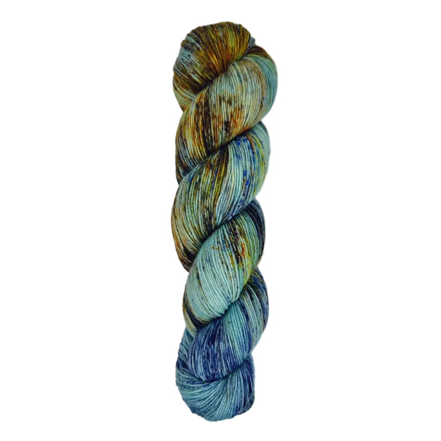 A skein of hand-dyed fingering/sock yarn color blue brown orange speckles