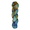 A skein of hand-dyed fingering/sock yarn color blue brown orange speckles