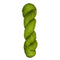 Skein of hand dyed fingering weight yarn in the color pea green 