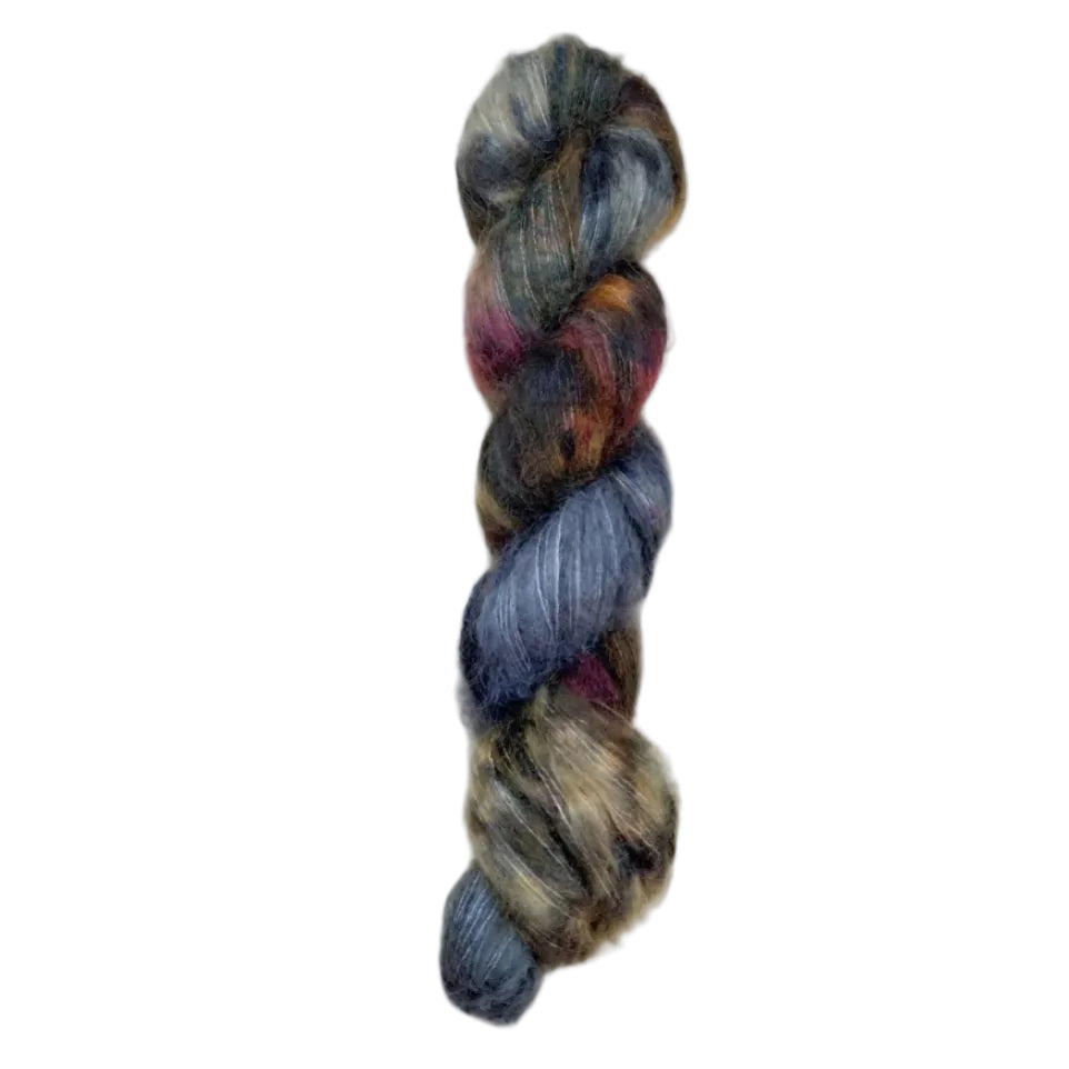 Skein of superkid mohair silk lace weight yarn color blue brown red black