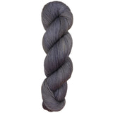 Gray skein of yarn on a white background