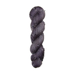 gray skein of yarn with black and white specks