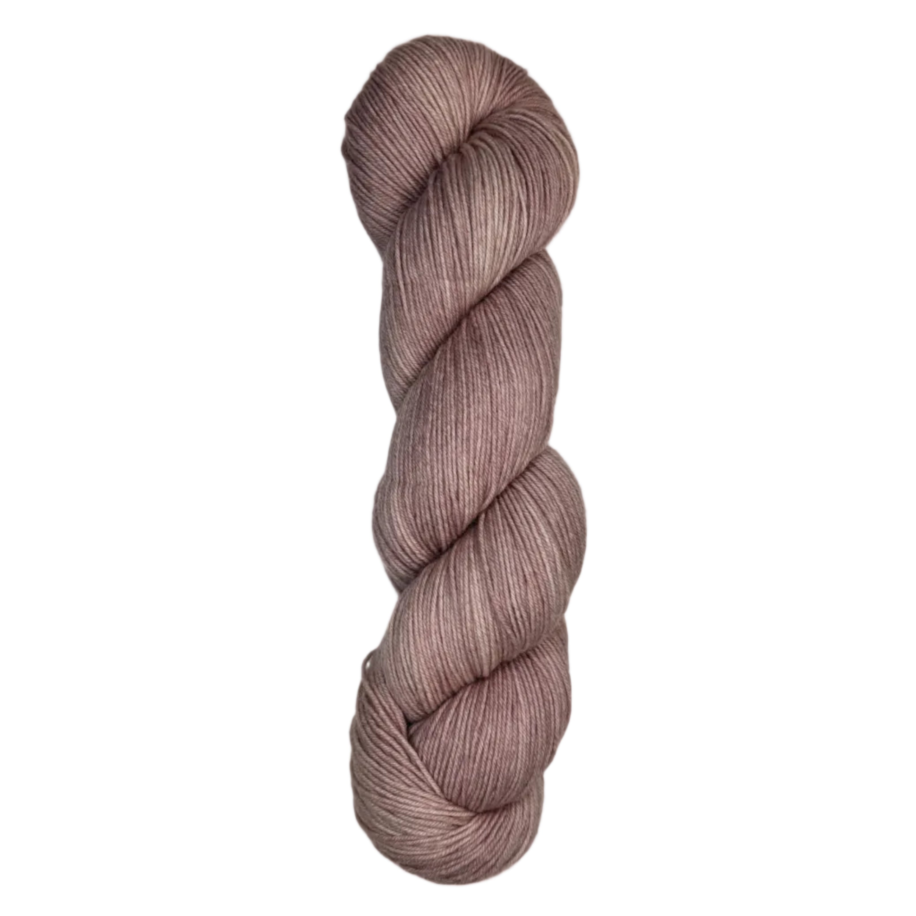 Skein of hand dyed fingering weight yarn in the color dusty rose