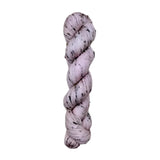 Skein of hand dyed BFL Tweed Yarn color dusty rose