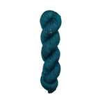 Teal skein of yarn  with speckles on a white background