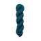 Teal skein of yarn  with speckles on a white background