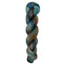 A skein of hand-dyed fingering/sock yarn color grey blue orange brown red black speckles