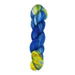A skein of hand-dyed fingering/sock yarn color white yellow blue 