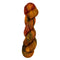 A skein of hand-dyed fingering/sock yarn color burnt orange red brown green speckles