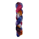 Skein of superkid mohair silk lace weight yarn color red blue orange black