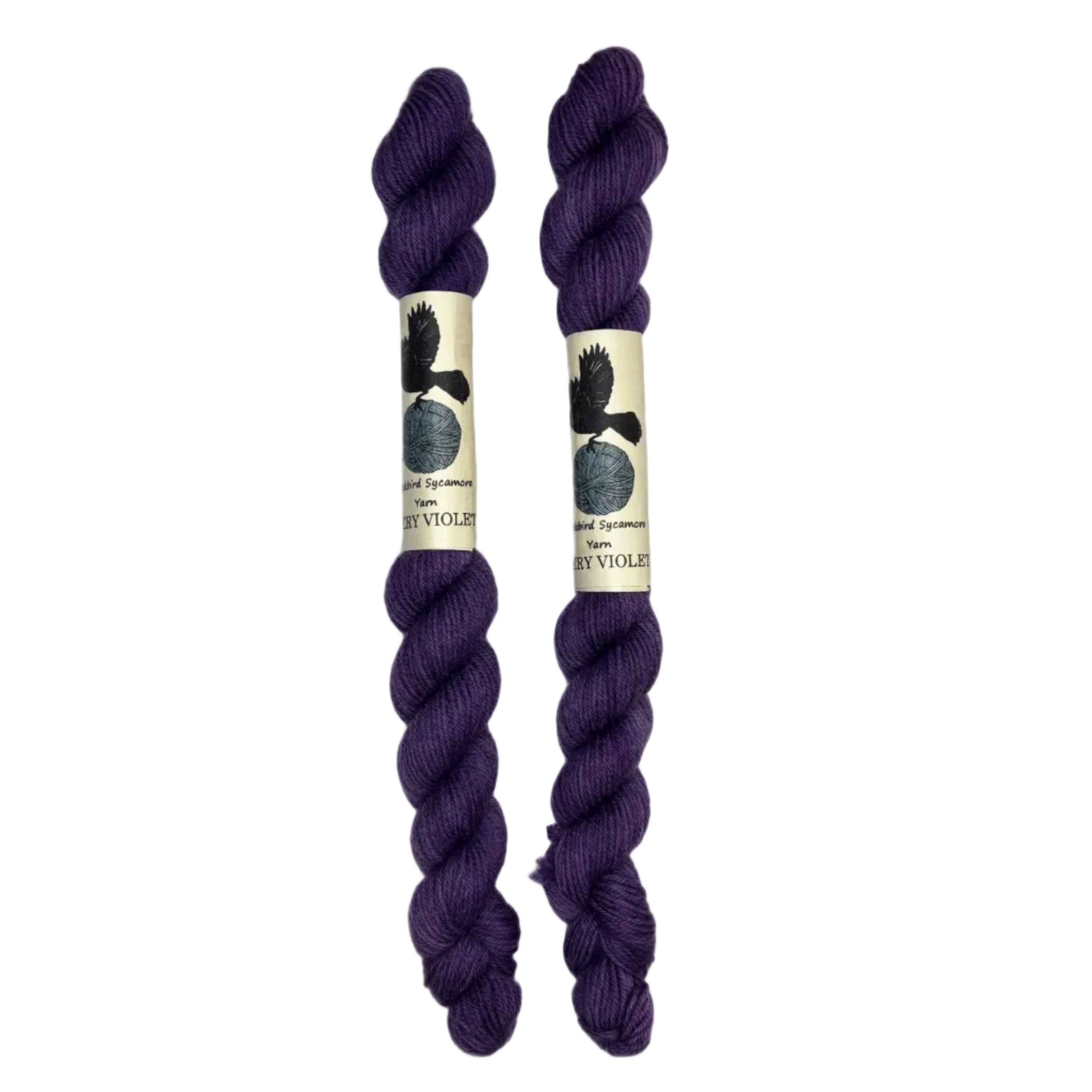 Mini skeins of hand dyed fingering weight yarn in the color violet